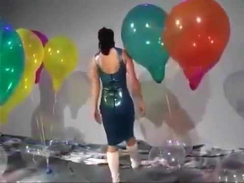 Footworship Sexy Girl In Latex Dress Blows to Pop Some Big Balloons Funk
