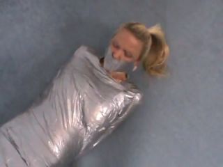 Gay Shorthair Blonde girl wrapped in duct tape struggles...