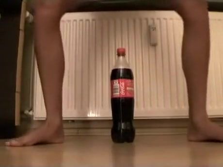Couch Tiny teen tries to ride a coke bottle Titjob
