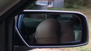 Puba Black slut sucking dick in car. View of ass. She