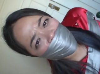 Sexy Girl cute asian taped on a chair Morocha